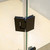 Modern frameless glass shower enclosure with stylish matte black hinges for contemporary Australian bathrooms.