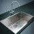 Durable stainless steel kitchen sink bottom grid with square tines and protective feet for renovator projects in Australia.