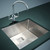 Handmade single bowl stainless steel kitchen sink with a brushed satin finish and square modern design for Australian home renovations.