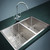 Modern Jinxunda double bowl stainless steel kitchen sink featuring protective bottom grids and sound-dampening pads for quiet operation in Australian homes.