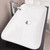 Top view of a Della Francesca Lagoon white ceramic above-countertop bathroom basin, a modern vessel sink for Australian home renovations.