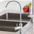 Puretec ESR2 series undersink UV water filter system with integrated Tripla 3-way LED mixer tap installed in a modern Australian kitchen benchtop.