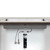 Puretec PureMix Z6 inline under sink water filter system installed horizontally under a kitchen bench in an Australian home.