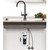 Puretec Tripla Z1-BL2 matte black three-way kitchen mixer tap installed on a modern sink for filtered and mains water.