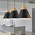 Modern Frida black E27 cone pendant light hanging in a contemporary Australian kitchen or dining area.