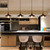 Industrial black coolie pendant light with E27 fitting and adjustable cable for modern Australian home interiors.