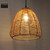 Snap Lighting Ezra brown rattan basket pendant light hanging in a modern Australian home.