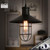 Troy Lighting Huxley black cage pendant light for modern Australian homes.