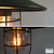 Snap Lighting Huxley black cage coolie pendant light for modern Australian home interiors and kitchen island lighting.
