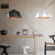 Modern Jasper dome pendant light in matte black with a white interior, ideal for stylish home lighting in Melbourne, Australia.