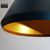 Modern Freya black and gold cone pendant light for stylish Australian home interiors.