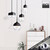 Snap Lighting Mara cylinder glass pendant light in a modern style with clear glass and metal accents for home decor in Australia.