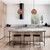 Two modern white pendant lights hanging over a marble kitchen island in a stylish Australian home interior.