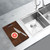 Swedia Dante Dromma wooden chopping board and stainless steel colander sink accessories in a modern Australian kitchen setup.