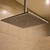Modern chrome handheld shower head with a flexible hose, ideal for contemporary bathroom upgrades in Australia.