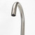 Modern round brushed nickel bath spout with aerated water flow for Australian bathrooms.