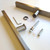 Square stainless steel door pull handle fixtures for modern Australian entrance doors.