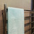 Modern 900mm wide chrome-finish heated towel rail for bathrooms in Australia.