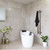 Aguzzo rose gold double bar vertical heated towel rail installed in a modern Australian bathroom.