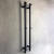 Aguzzo matte black vertical heated towel rail for modern Australian bathrooms.