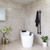 Aguzzo Ezy Fit matte black double vertical heated towel rail installed in a modern Australian bathroom.