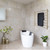 Modern brushed brass 900mm square heated towel rail installation on white bathroom tiles by Renovator Store Australia.