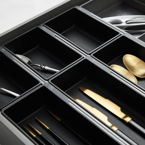 High-quality dark grey kitchen cutlery tray and drawer insert with multiple compartments for silverware and utensil organization in Australian homes.