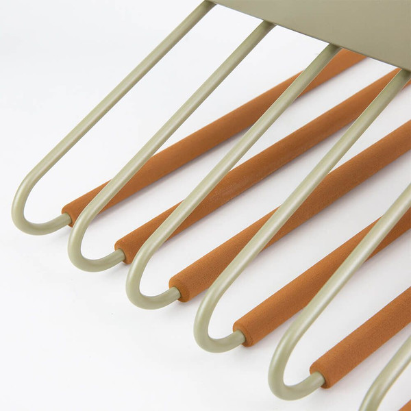 Pull-out steel trouser rack for organized wardrobe storage in Australian homes.
