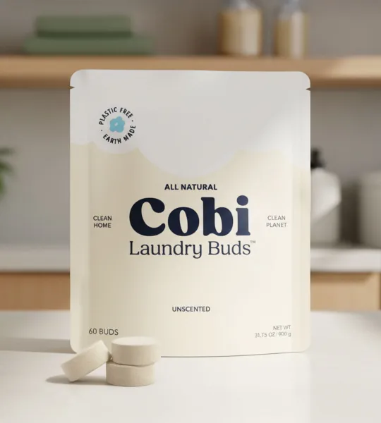 Cobi Laundry Buds pouch with buds on a laundry room counter