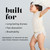 Toddler joyfully jumping while holding a white blanket overhead, wearing a Change Diapers diaper. Text lists diaper benefits: long-lasting dryness, fast absorption, breathability — engineered to industry re-wet and strike-through standards.