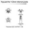 YTP12X33 Pack of 5 high polished titanium Internally threaded labret tops in a flat flower shape with a single bezel set central crystal
