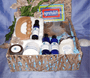 Lupis basket filled with bath and body products, with a card that says "Congratulations"