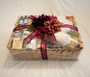 Our Signature basket dressed in "Fall Attire" Hyacinth woven basket filled with robe, headband, soap, slippers, and aromatherapy products.