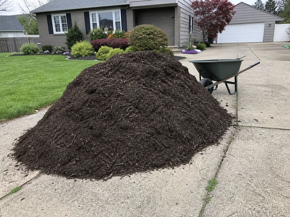 Bulk Landscape Supply vs. Bagged Products: A Cost Breakdown for Northeast Ohio Homeowners