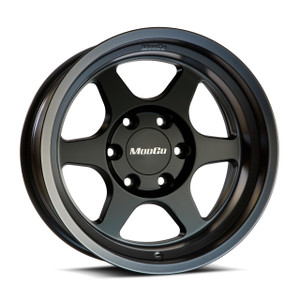 ModCo wheels M71 alloy in black finish, at an angle over a plain white background. ModCo wheels M71 alloy in black finish, at an angle over a plain white background.