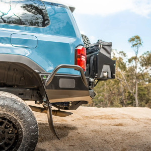 Accessory swing-out with storage box on The Cruiser Company rear bumper for Toyota Land Cruiser 250