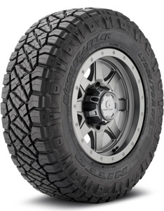 The Nitto Ridge Grappler tire mounted over a gray alloy off-road wheel.