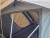 A zoomed-in view of the interior of Front Runner's roof top tent.
