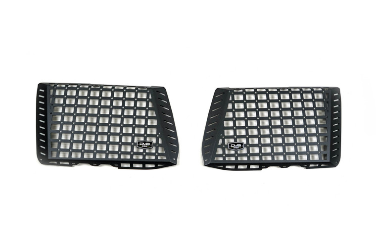 White background showcasing DV8's pocketed interior window storage / molle panels for the LC250 Land Cruiser