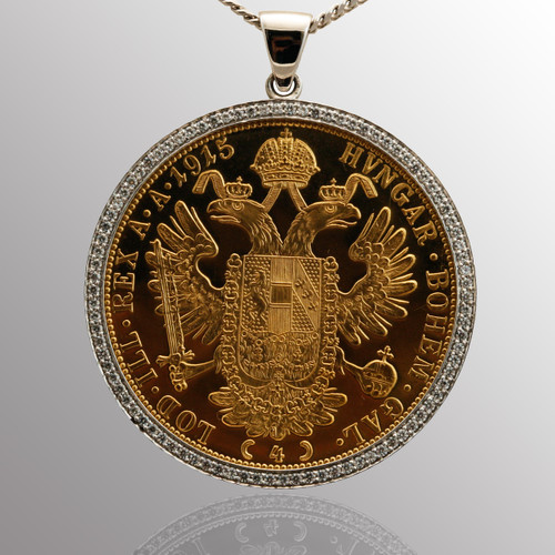 Custom pendant - 14K white gold surrounding an antique coin made of 18K yellow gold and 1/2ct. diamond.  40mm wide.