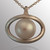 Silver pendant with 12mm pearl and 22in. adjustable chain.