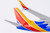 Southwest Airlines 737-700/w with scimitar winglets; equipped with CFM56 engines N556WN with stand 05005 1:200