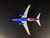Southwest Airlines 737-700/w  N221WN with stand 05006 1:200 (REPAIRED STABILIZER)