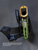 Side profile of a single-layer mid-drop OWB holster with Multicam Original Cordura wrap, Zombie Green shell, Speed Lock Level 2 retention, and optional adjustable leg strap, highlighting the holster's slim profile.