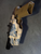 Rear view of a suppressor-friendly FN 509 holster featuring a Japanese castle wrap. Shows adjustable retention hardware, universal mounting hole pattern, and open-top design for suppressor compatibility.