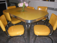 50’s dinette set brought back to life with yellow Cracked Ice vinyl replacement seats and backs