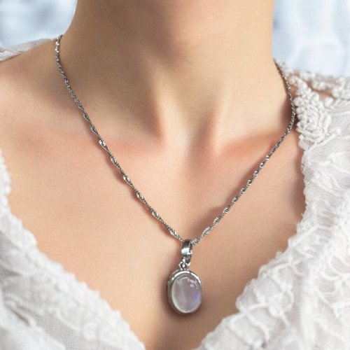 silver necklace with moon stone pendant