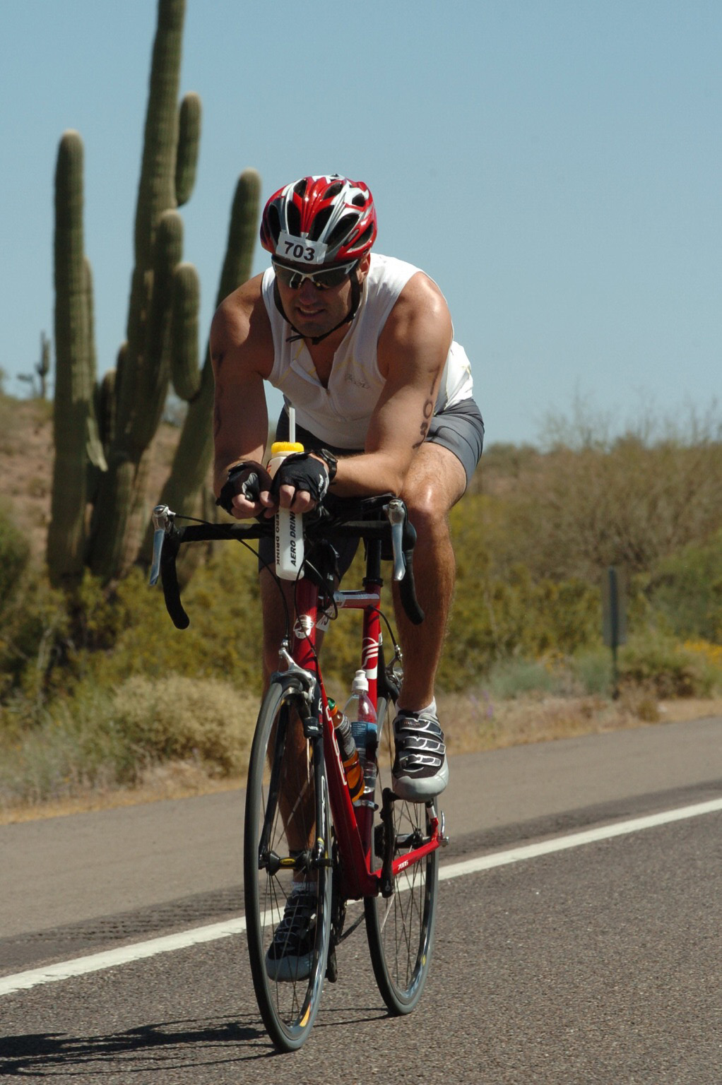 Patrick Dolan, founder of Medal Blocks, finishing a triathlon with a race medal.