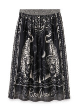 ME369 Magic Vanessa pleated midi skirt featuring intricate graphic artwork, symbolic elements, and a flowing silhouette with an elastic waist.