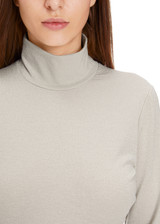 Marc Cain Smoke T-Shirt with Feminine Sheen, Slim Fit, Turtleneck, Semi-Sheer with Lurex Details. Marc Cain Smoke T-Shirt with Feminine Sheen, Slim Fit, Turtleneck, Semi-Sheer with Lurex Details.